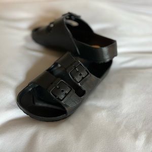 Toddler sandals, black, plastic, brand new, no brand visible